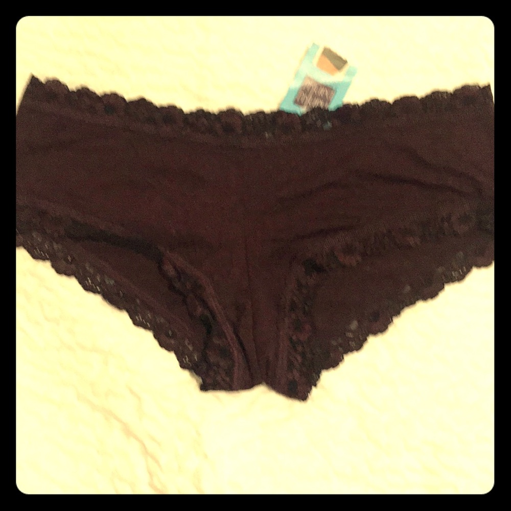 Soft stretch knit, organic cotton with lace trim.